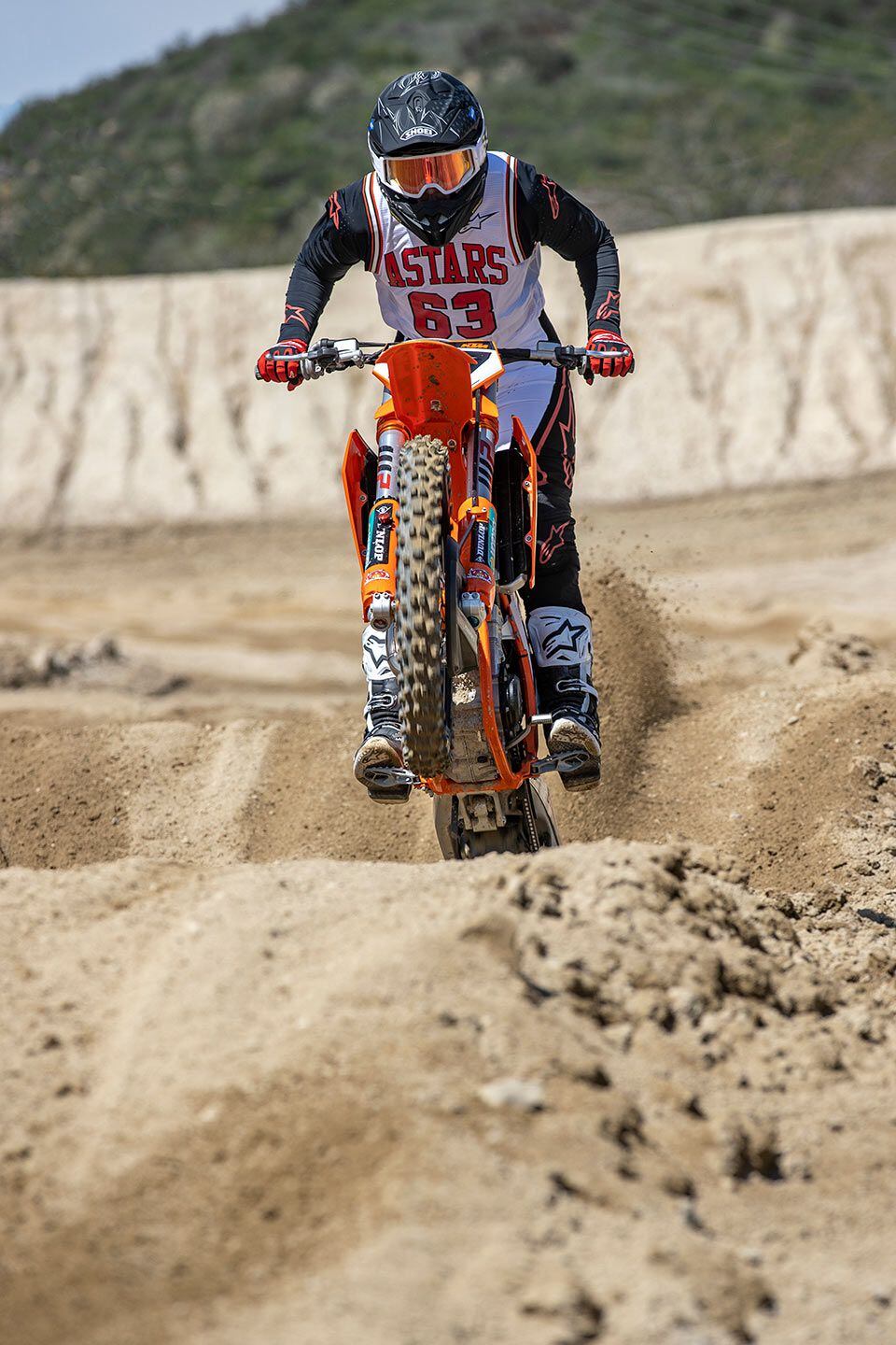 KTM’s 450 SX-F Factory Edition is a motocross race weapon with plentiful but manageable power, a firm suspension setting, neutral-handling chassis, and numerous functional and aesthetically pleasing components.