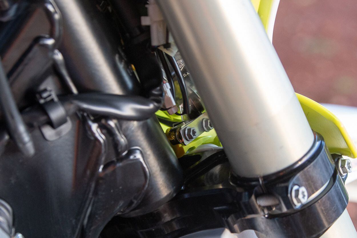 “You want to take every precaution possible for hard enduro. We don’t have a problem with these, but I made a special custom bracket for the back of the front number plate. So if something does happen and they crash, there’s extra stability on the back side so it doesn’t break, since it’s made of plastic.”