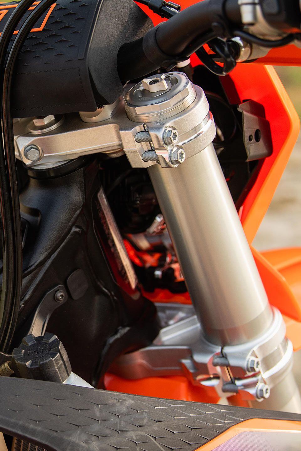 New forged triple clamps have some machining in crucial areas to improve performance and comfort.