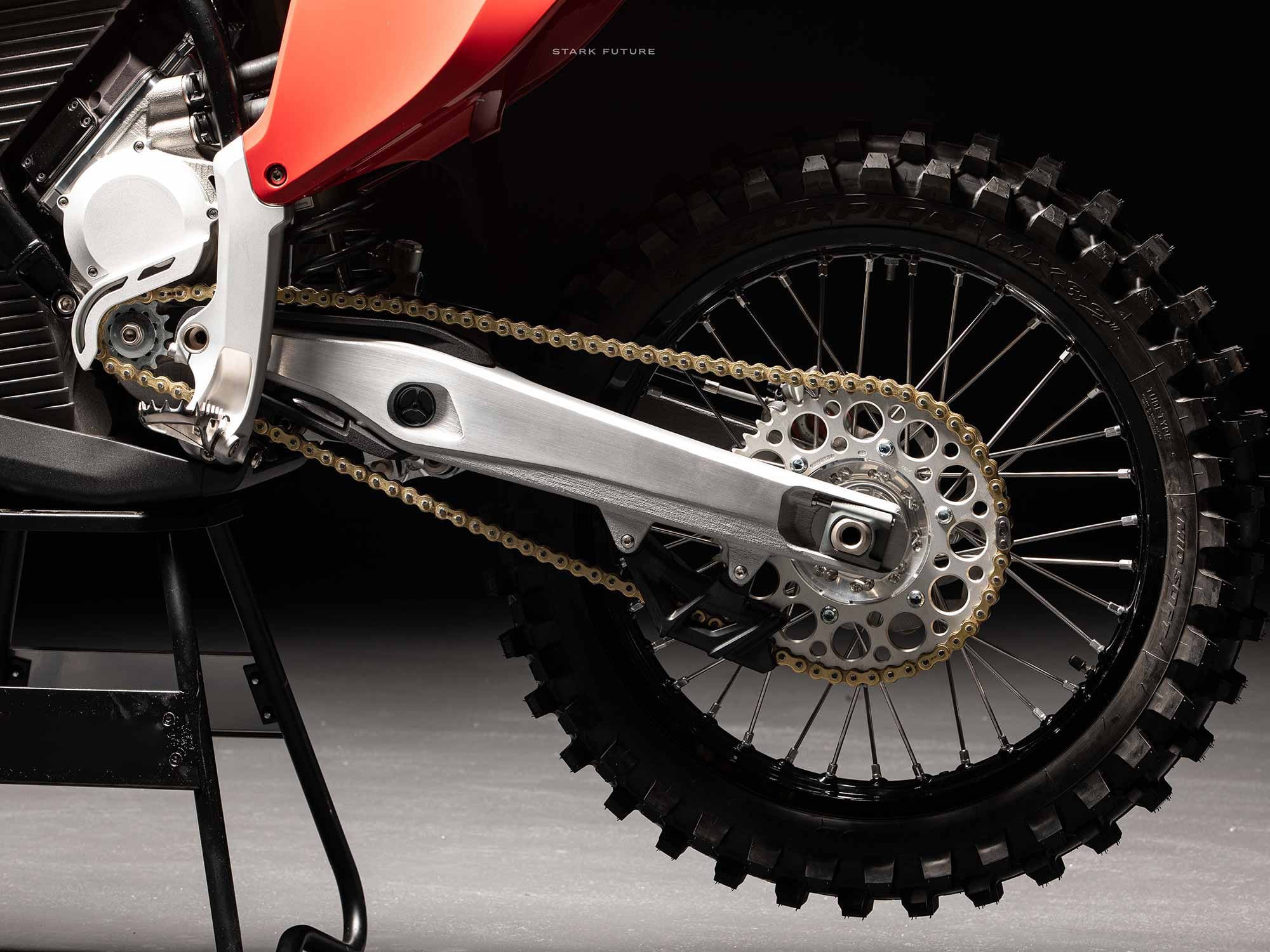 Stark developed its own wheelsets for the Varg and specced Pirelli MX32 tires. Also visible here is a closer look at the Varg-exclusive skid plate and how it serves as the bottom of the frame as well as where the carbon fiber subframe melds beautifully to the main part of the chassis. The pegs are made of a special stainless steel that Stark claims is 40 percent stronger than either titanium or chrome-moly.