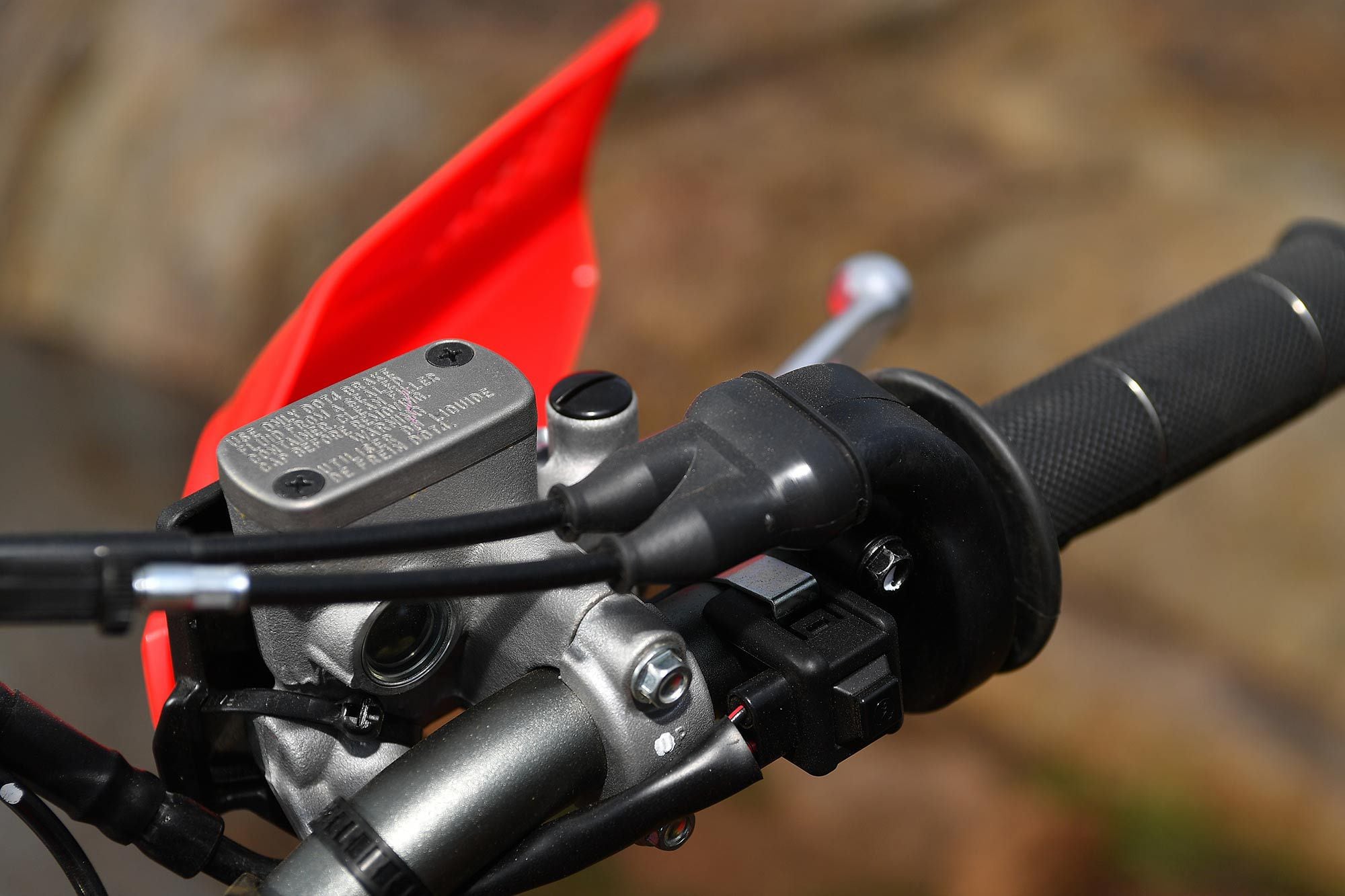 The Honda CRF450X and CRF450RL feature differing front brakes than those of the CRF450R and CRF450RX. Combined with a 260mm front rotor, the CRF450X can stop in a hurry for a heavier trailbike.