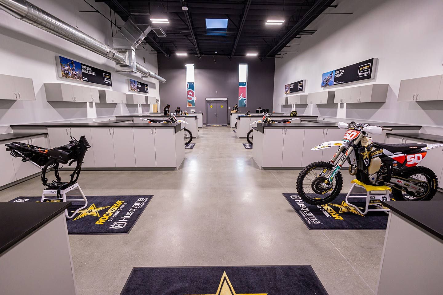 Rockstar Energy Husqvarna Factory Racing off-road team shop. On the left we see an FX 350 for Craig DeLong waiting to be built by his mechanic Kade O’Grady, while on the opposite bay is Austin Walton’s FX 450 ready for action.