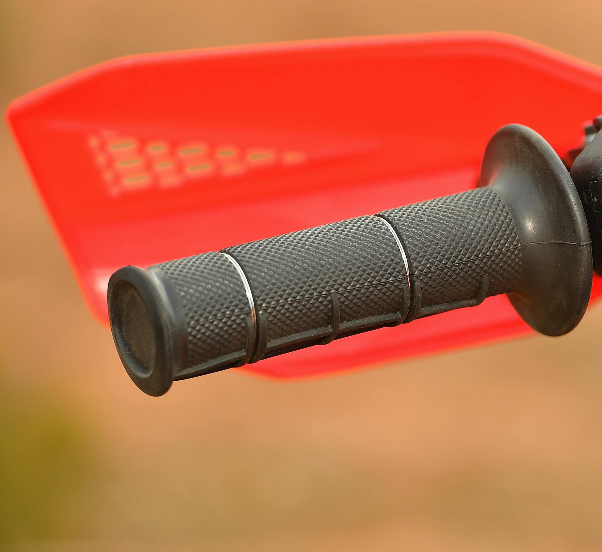 A quick tip: While stock bikes rarely come with proper safety wire as photographed, it’s always a good idea to wire up traditional glue-on grips.