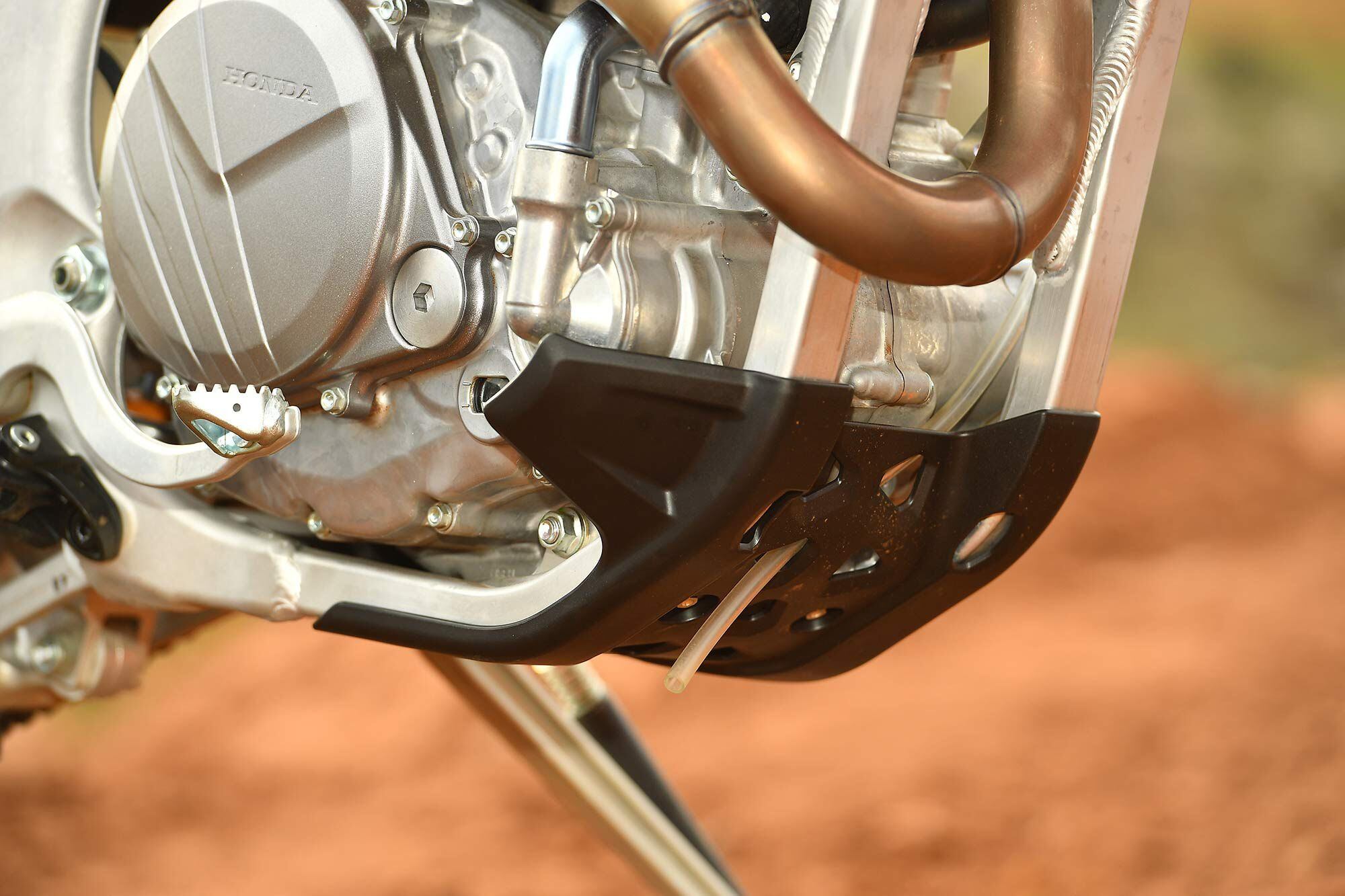 Standard equipment skid plates and steel head pipes are always a good idea for closed-course off-road racing models.