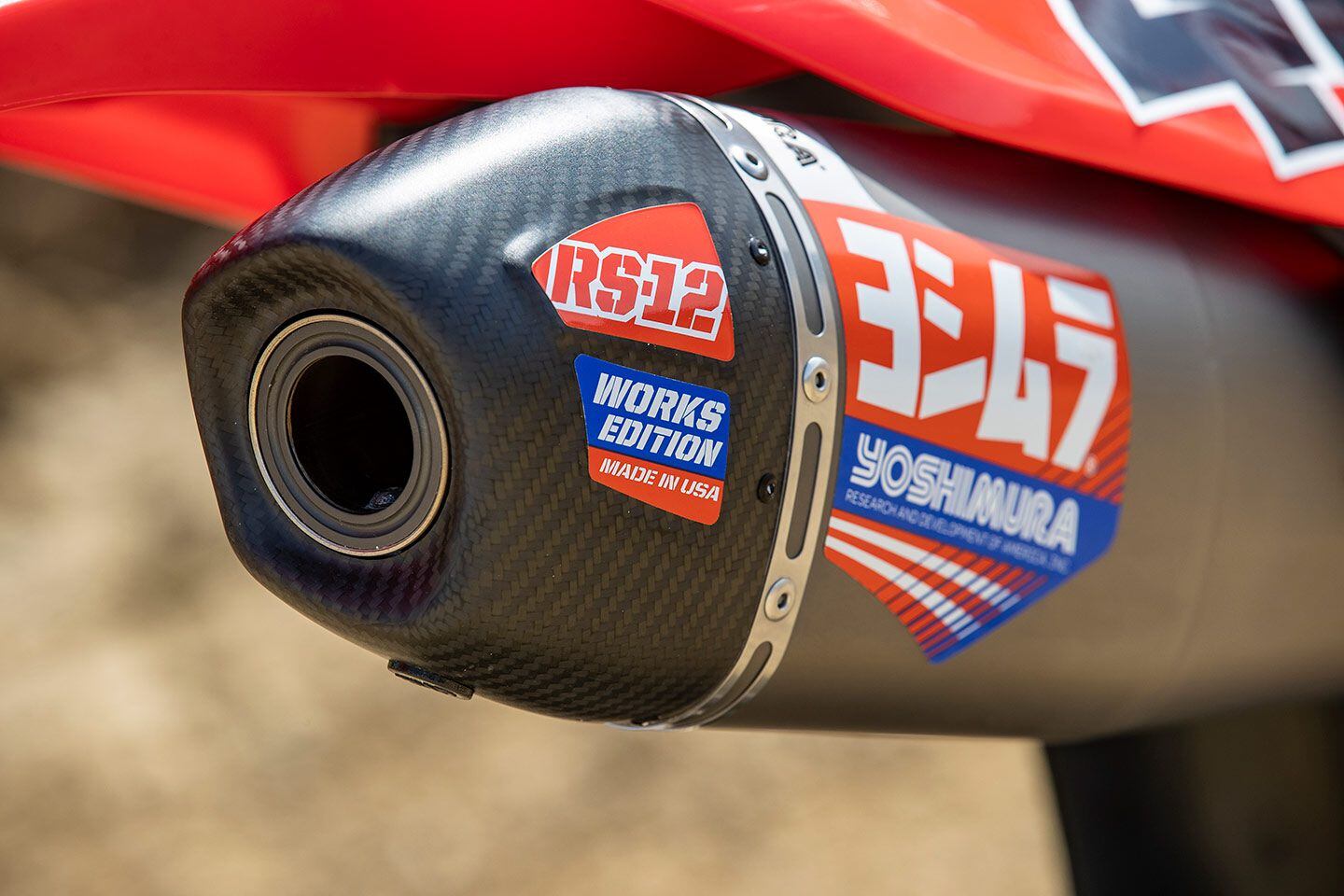 Aforementioned carbon fiber end cap on the titanium Yoshimura can. The insert is removable, but with such a perfect tone and power characteristic, I’m not sure it’s advisable on the CRF450RWE.