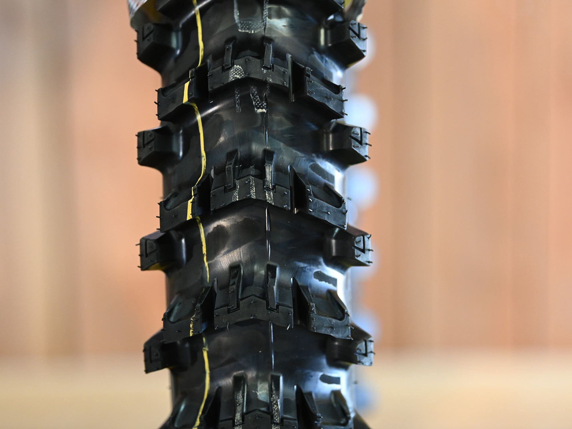 According to Dunlop, the optimized tread design and block angles are intended to improve the tire’s scoop/paddle effect.