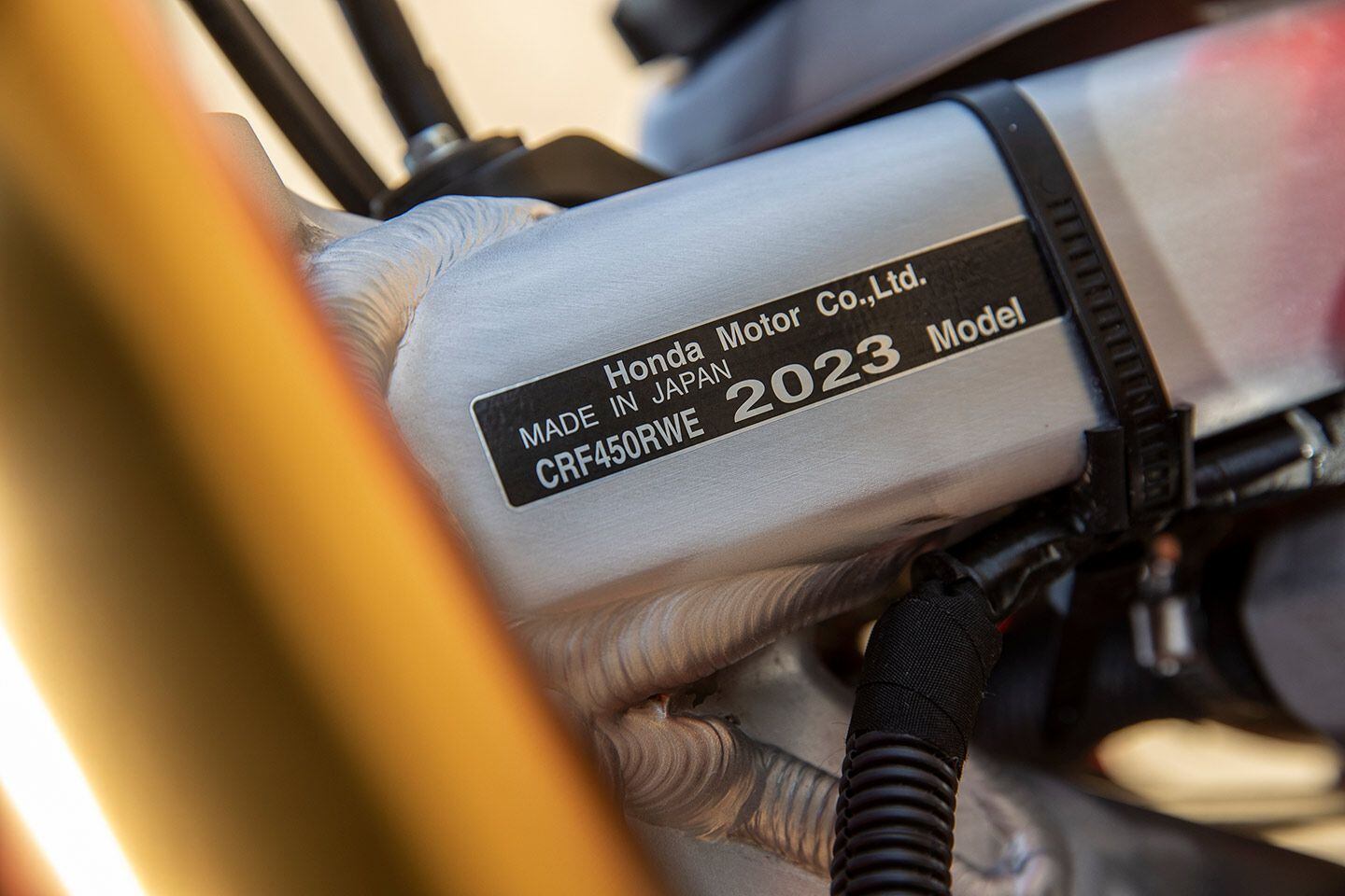 Note the model-specific frame tag: Between the CRF450R, CRF450R 50th Anniversary Edition, CRF450R-S, CRF450X, CRF450RL, and CRF450RWE, it’s easy to get confused among the many offerings.