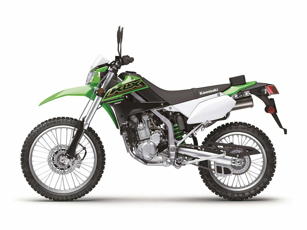 The steel perimeter frame of the KLX300 has a different rake and trail than the KLX250. The new, higher-displacement machine is also said to weigh 2 pounds less than the outgoing model.