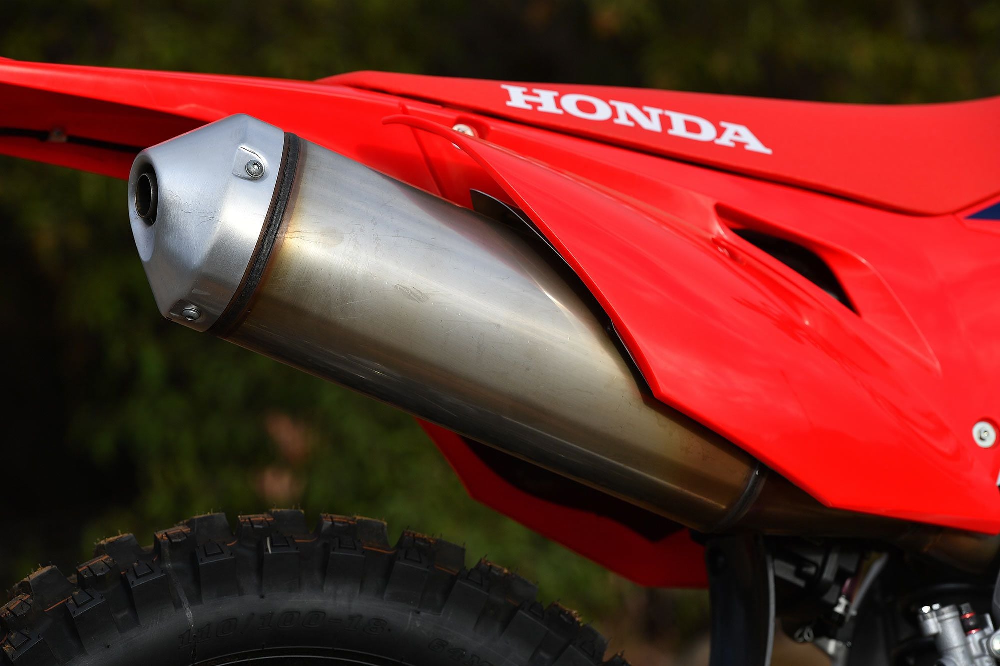 The muffler is CRF450X-specific, differing from that of Honda’s CRF450RL. The exhaust note is pleasant and quiet, but a healthy variety of aftermarket units are available to uncork additional ponies.