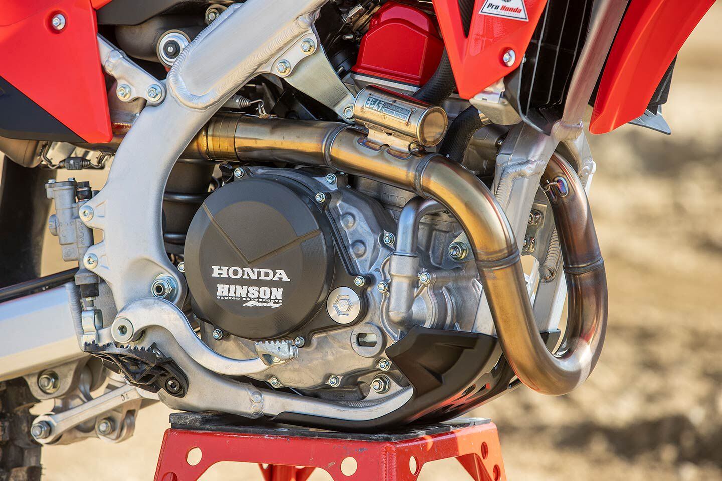 Hinson Racing supplies the clutch cover, which is a Honda-exclusive part number. The Yoshimura RS-12 system features a longer stainless steel header with resonance chamber, titanium mid-pipe and muffler, and carbon fiber tip. The Yoshimura’s welds are even more stunning in person.
