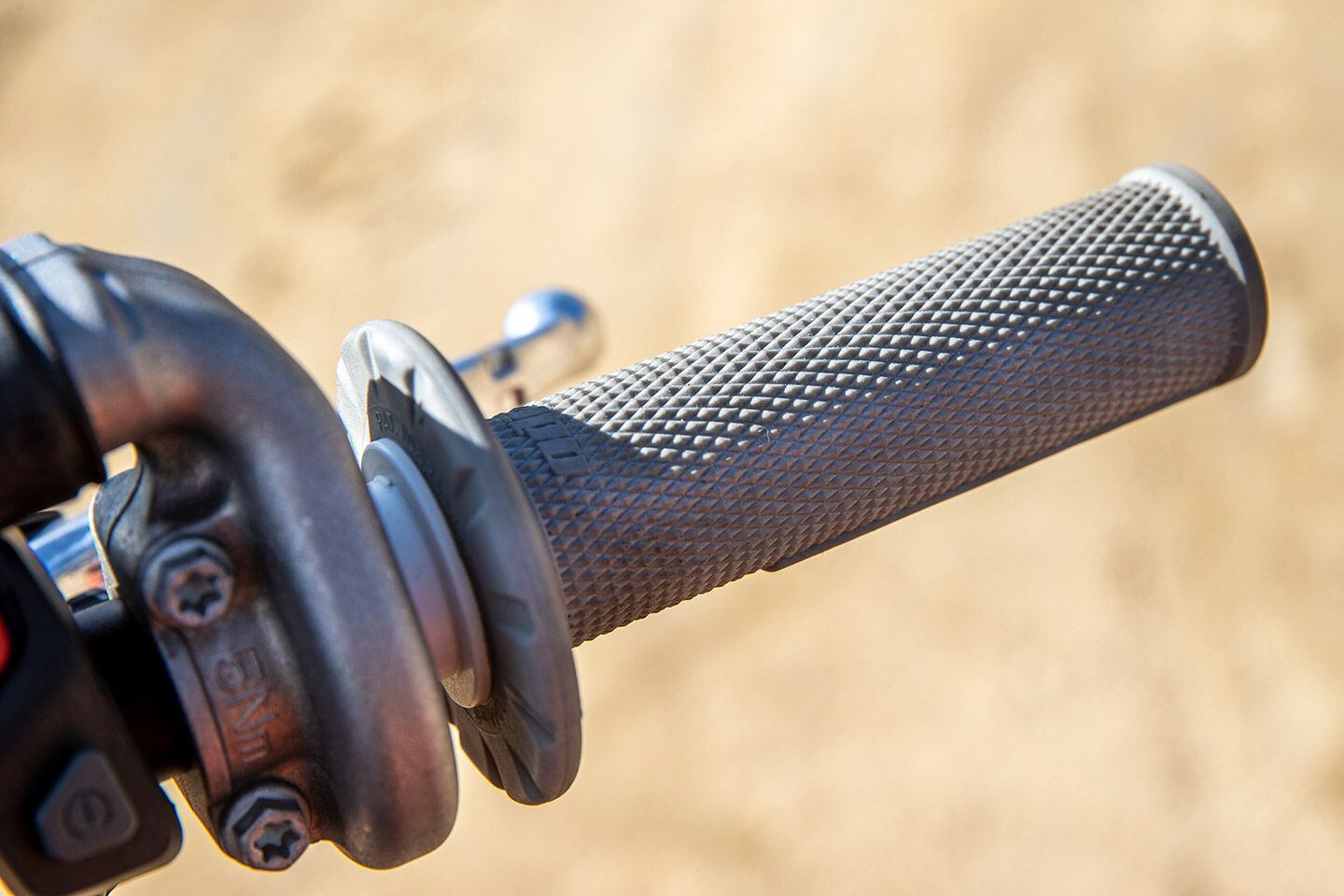 Gray ODI lock-on grips are softer than the black ones on the standard 450 SX-F.