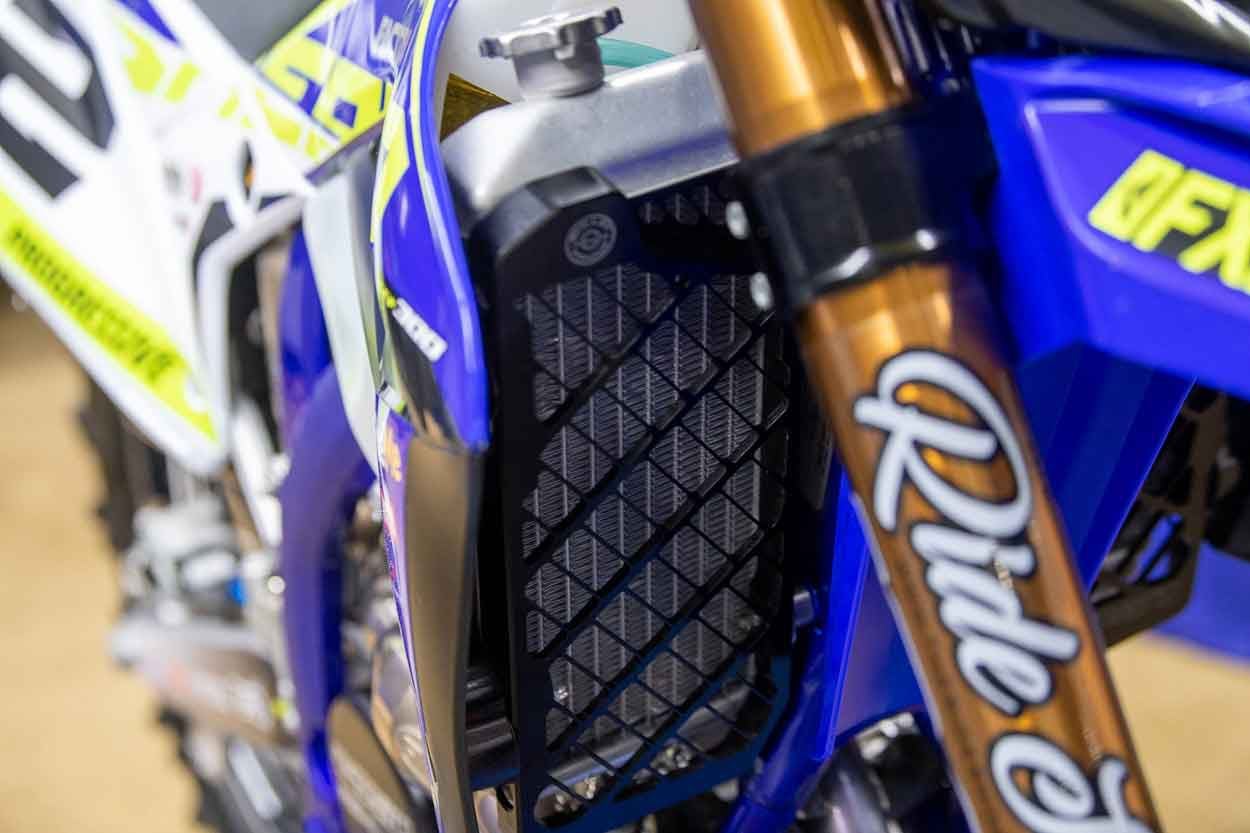 Radiators are OEM with a fan on the right side. The louvers are trimmed for more airflow as well being that four-strokes generally run hotter.