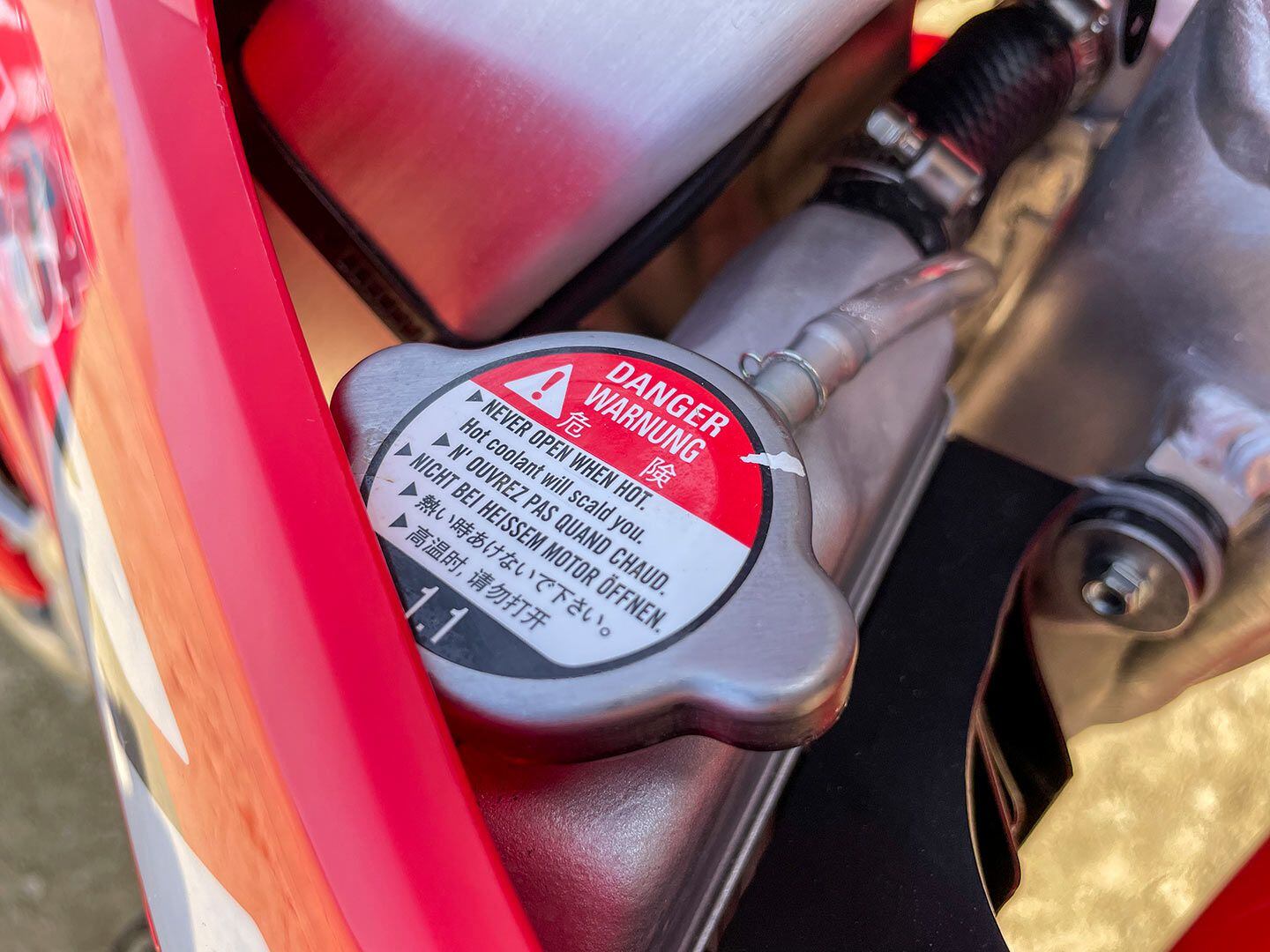 A 1.1-bar radiator cap comes standard, though a 1.6-bar or 1.8-bar would be advisable for a majority of racing consumers.