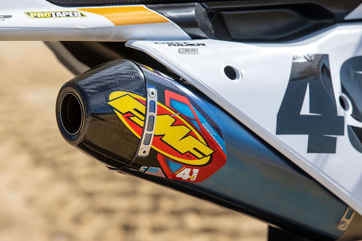 The lone add-on to increase engine performance is an FMF Factory 4.1 RCT slip-on muffler. Constructed of titanium with a carbon fiber end cap, this component is a $799.99 value when purchased through the aftermarket. Header pipe is the same as the standard model.