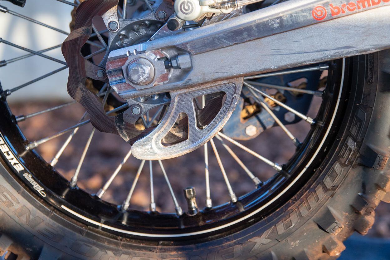 “We use a new rear brake disc guide from a company called Hunt Racing Products, which makes a thicker rear brake disc guide to help protect against rocks, trees, or anything that might bend the rear brake rotor.”