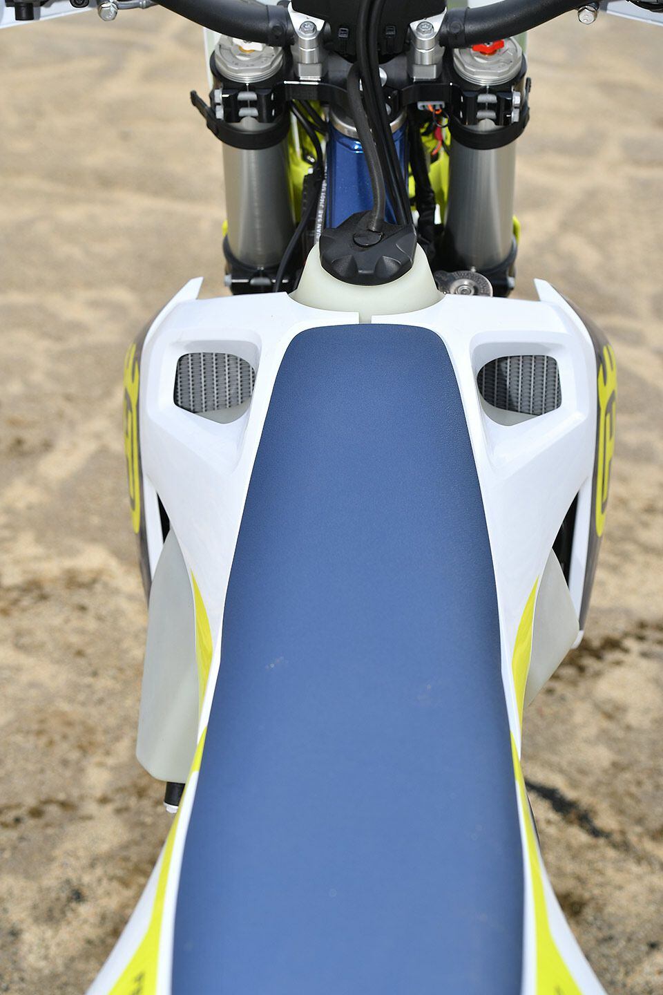 The FE 450 boasts the largest fuel-tank capacity of Husqvarna’s entire enduro and dual sport lineup at 2.4 gallons. Fuel is stored low, which allows the tank and radiator shrouds to remain narrow.
