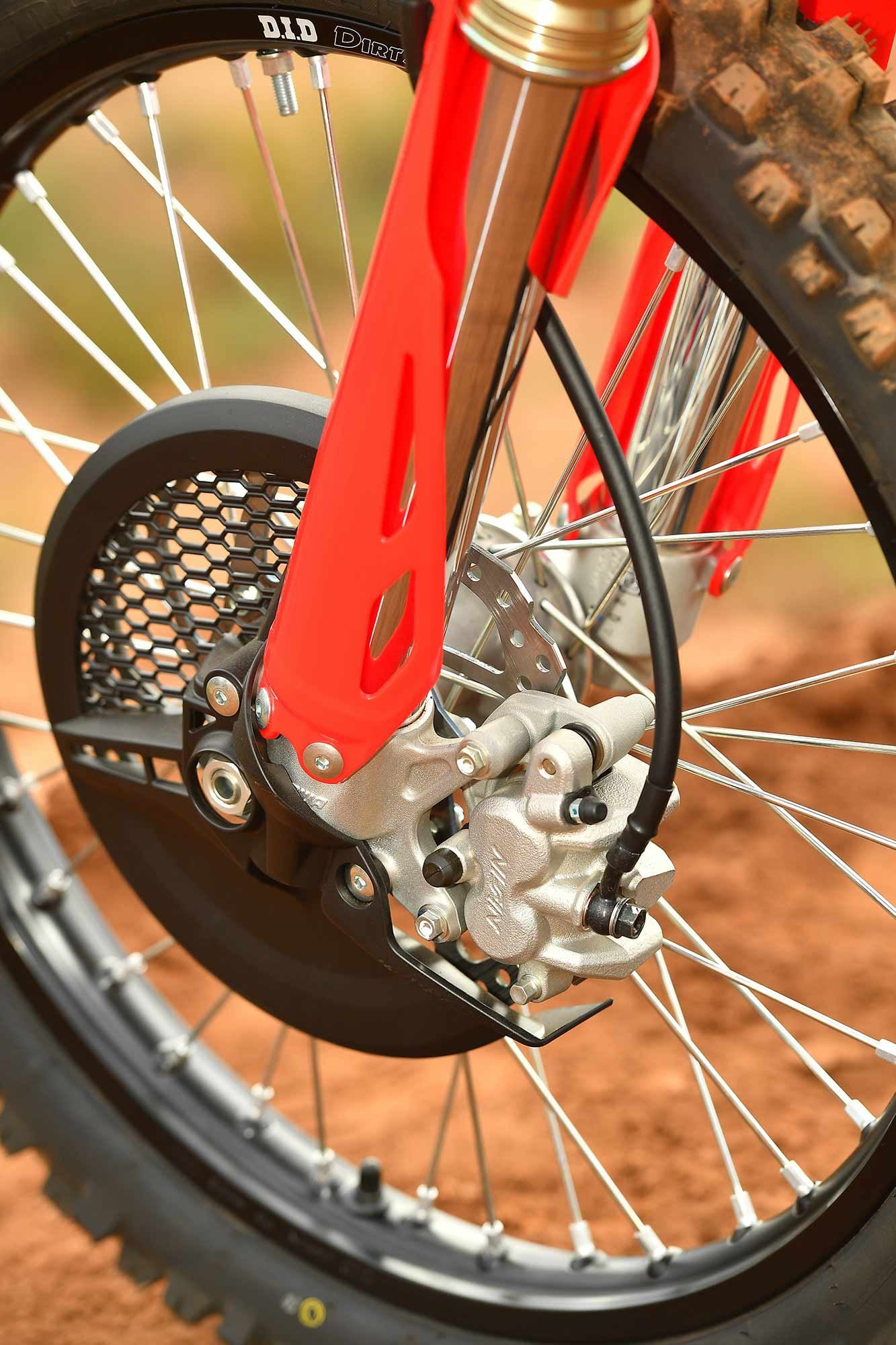 Honda’s CRF450RX uses the same powerful front brake as the CRF450R. The 30mm/27mm piston design was a works-bike exclusive only a few years ago.