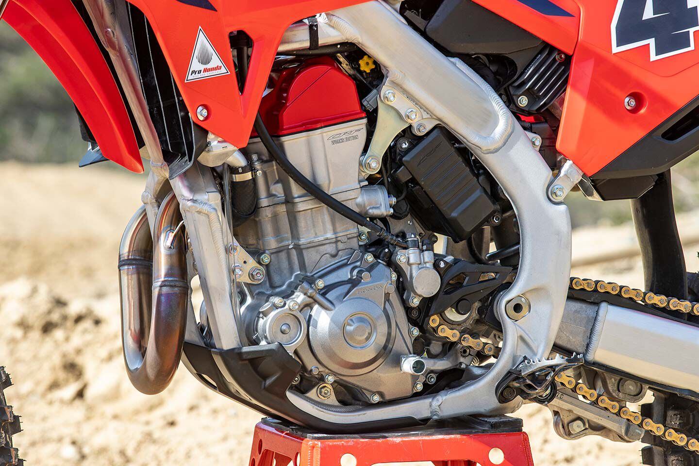 Long known as a powerhouse engine in the 450cc class, the CRF450RWE graces owners with a more manageable spread. The Yoshimura exhaust, polished ports, and special ECU settings enhance an already-potent package.