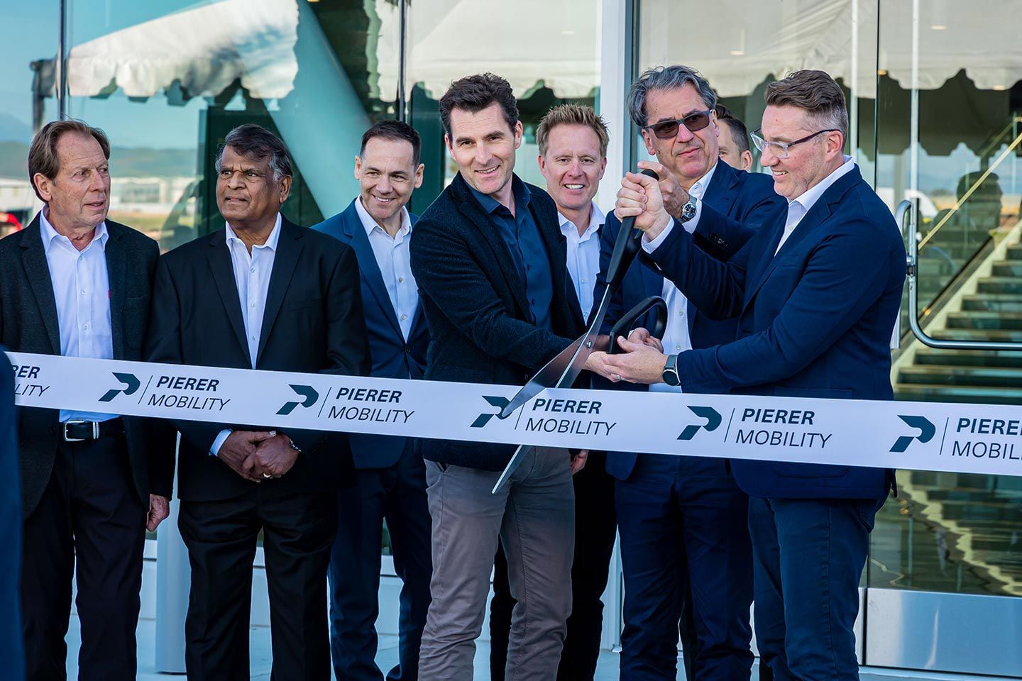 Cutting the ribbon to celebrate the new $53 million campus.