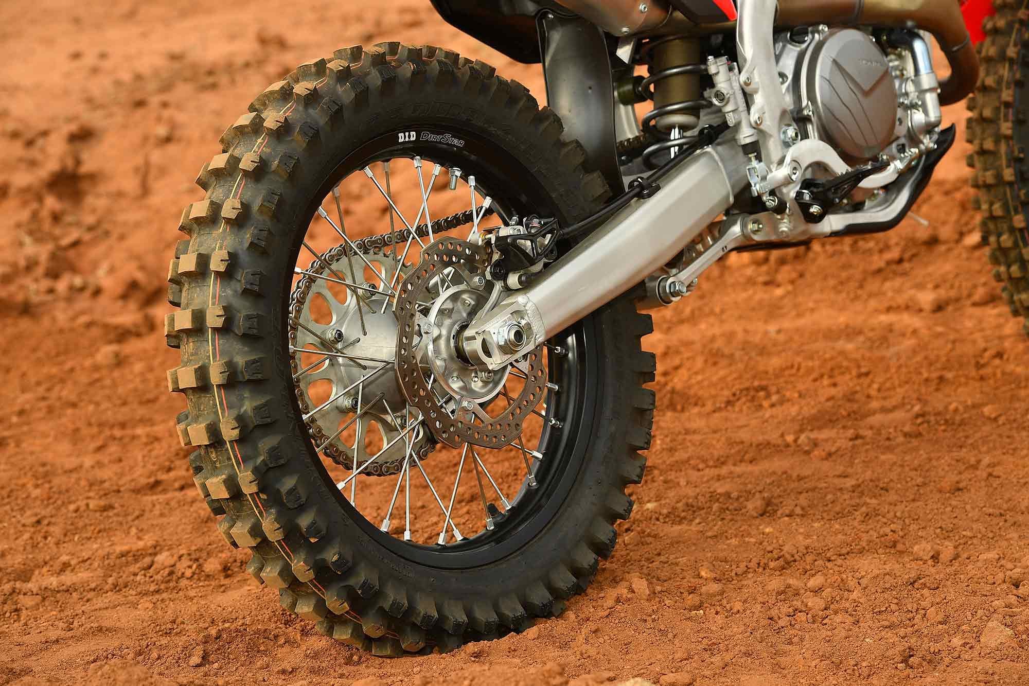 Black D.I.D DirtStar rim holding the 18-inch Dunlop Geomax AT81 rear tire.