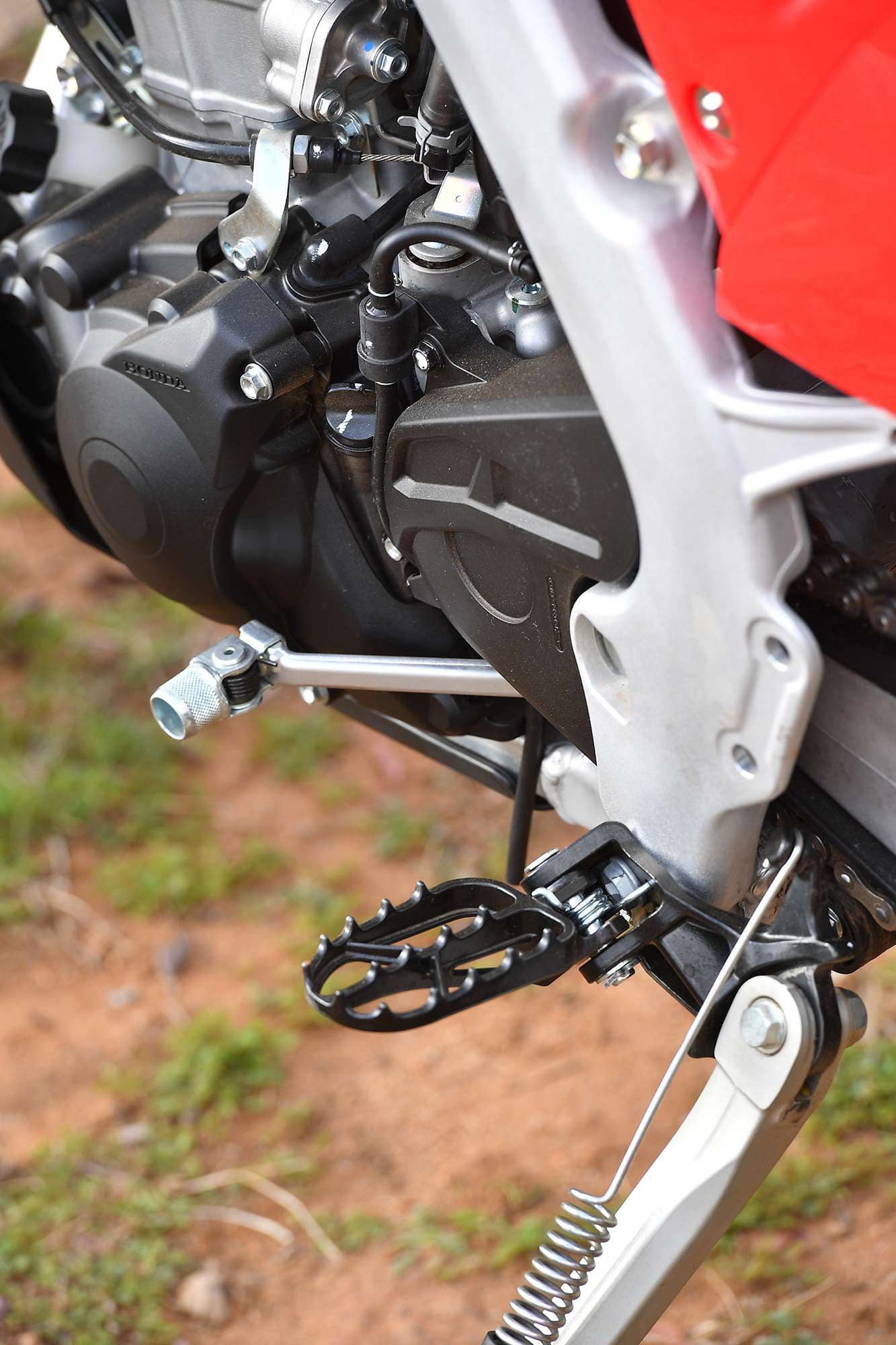 Proper wide footpegs and a tucked-in kickstand assembly.
