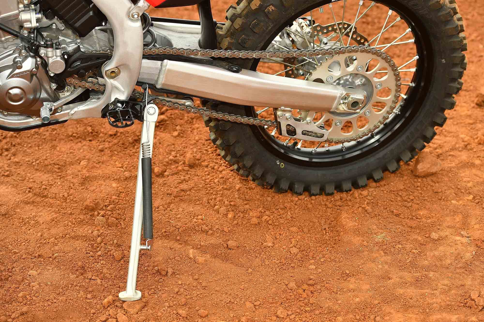 A proper kickstand makes the CRF450RX off-road ready. For racers needing to remove it for varying reasons, the CRF450R footpeg bracket is a direct fit. Both bikes utilize the same footpegs. The step bracket part number is 50611-MEN-B10.