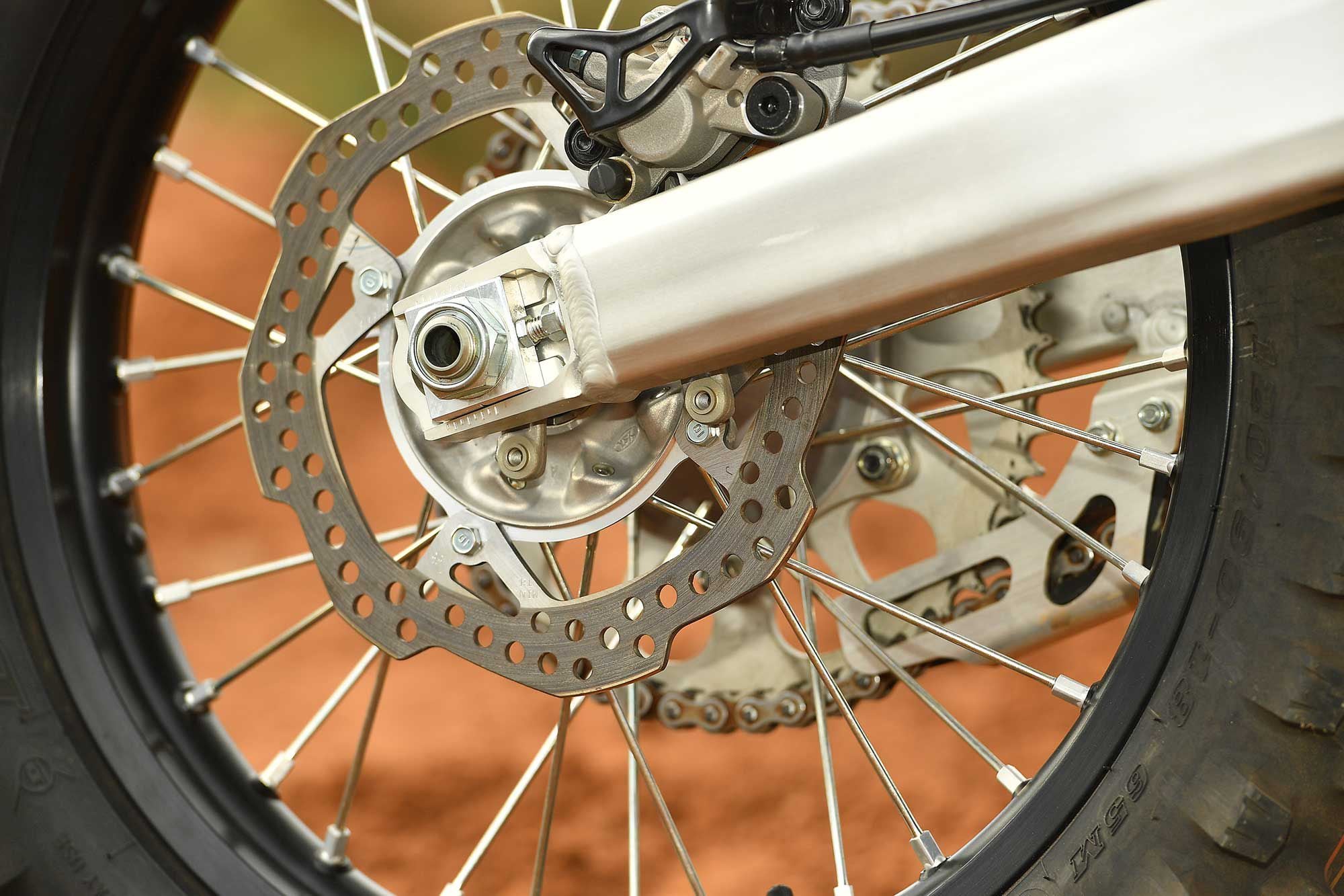 This 240mm rear rotor must’ve had some time on it before photos?! Only thing missing from front to back off-road protection is a plastic rear rotor guard. Thankfully, the mounting tabs to install one remain on the rear brake hanger, and previous units fit right on with the two-bolt design.