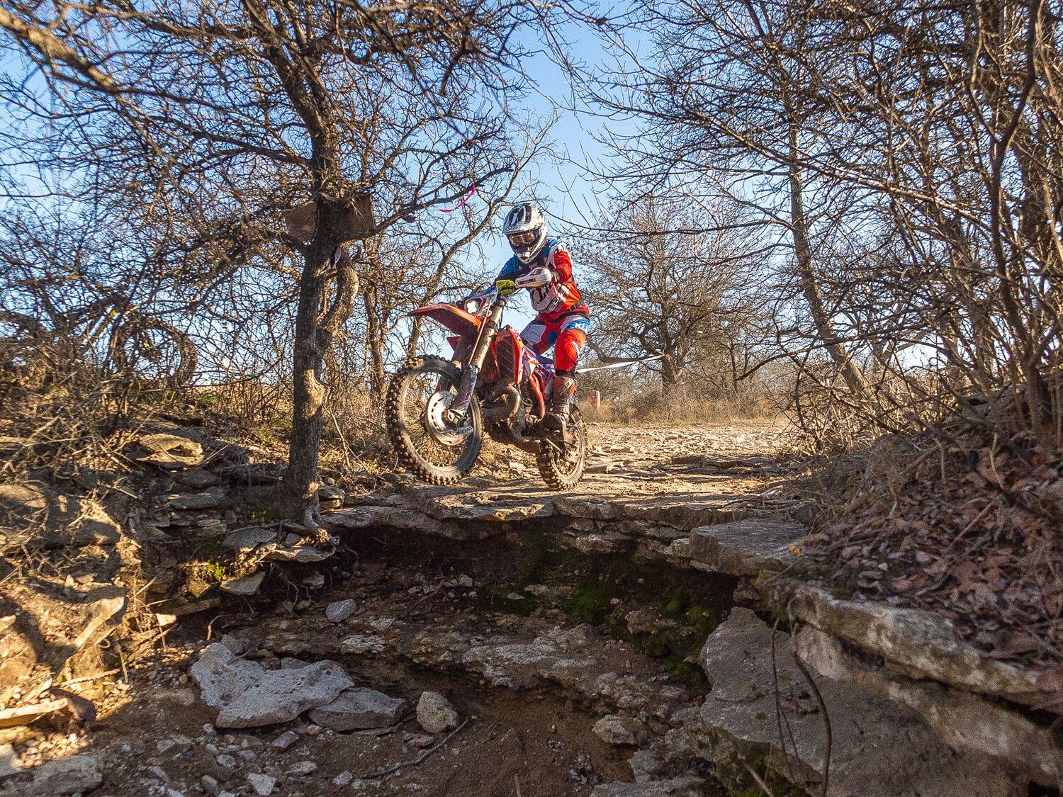 Spot your landing and pop the clutch in order to lift the front end off the ledge.